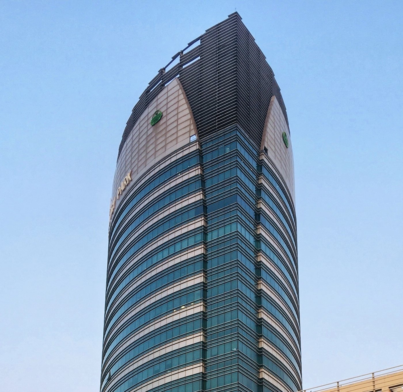Arfa Software Technology Park tower in Lahore against a clear sky.